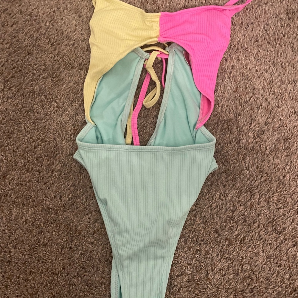 Women’s colorful one piece open bathing suit